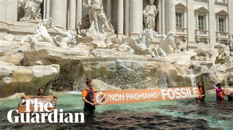 Climate activists trevi fountain rome - Climate activists in Italy released black liquid into Rome's famous Trevi Fountain black on Sunday, days after 14 people died during severe flooding in the country's north-east. Activists from the ...